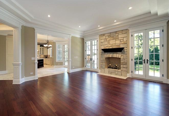 gleaming hardwood flooring in a spacious open-concept kitchen